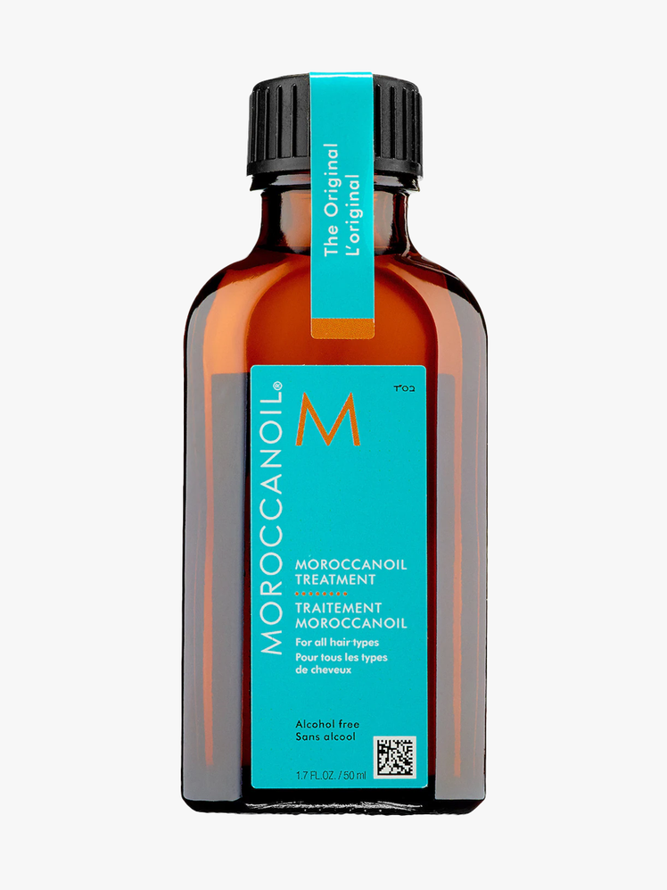 Moroccanoil Treatment Original in branded amber bottle with black cap on light gray background