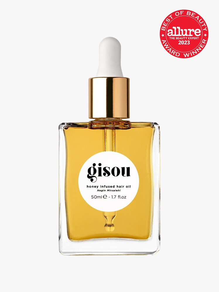 Gisou Honey Infused Hair Oil square dropper bottle of gold hair oil on light gray background with red Allure Best of Beauty seal in the top right corner