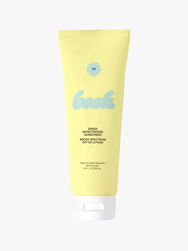 Bask Sheer Moisturizing Sunscreen SPF 30: A yellow tube of sunscreen with blue text and white cap on a light gray background