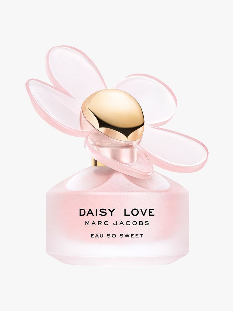 A pink bottle of the Marc Jacobs Daisy Love Eau So Sweet Eau de Toilette on a light gray background