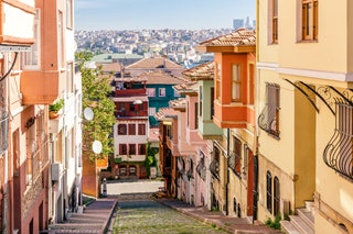 Image may contain Path Walkway Sidewalk Pavement Flagstone City Town Urban Road Street Building and Cobblestone