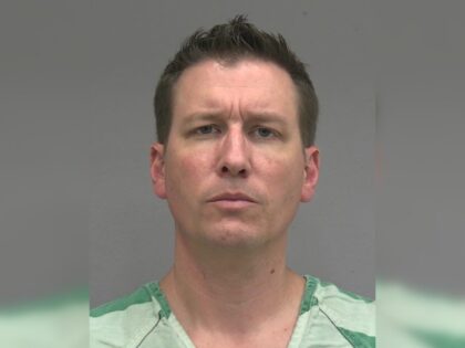 Never Trumper Joel Searby booking photo