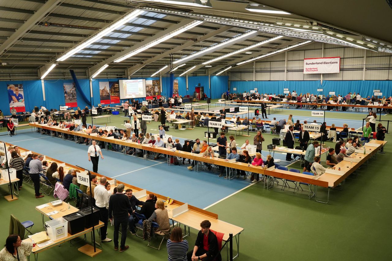 Election workers are seen in Sunderland, northern England, on Thursday July 4.