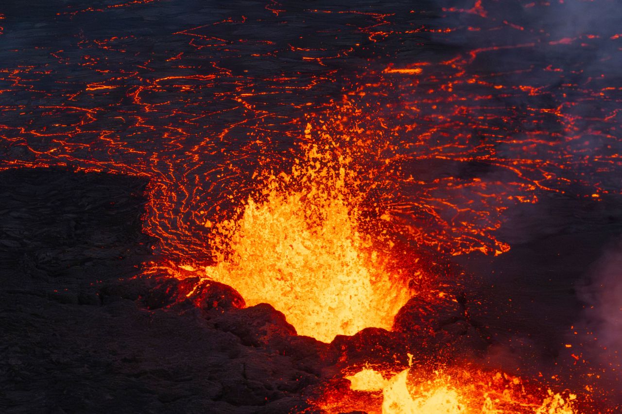 Lava bubbles up from a fissure of the active volcano near Grindavik, Iceland, on Tuesday.