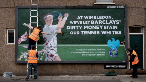 In a protest against Barclays' sponsorship of Wimbledon, activists from anonymous arts collective Brandalism have replaced commercial billboard, bus stop and tube ads surrounding the prestigious tennis tournament, which opens on Monday, with hard-hitting artworks targeting Barclays' links to arms companies and the climate crisis. 30/6/24
 Photo Tom Pilston. 
