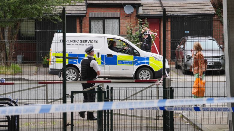 Forensic officers in Shepherd's Bush, west London, after human remains were found in two suitcases near the Clifton Suspension Bridge in Bristol. Picture date: Saturday July 13, 2024. PA Photo. The suspect is thought to have travelled to Bristol from London earlier that day, the Metropolitan Police said. A 34-year-old man was arrested in the Bristol area in the early hours of Saturday, police have said.