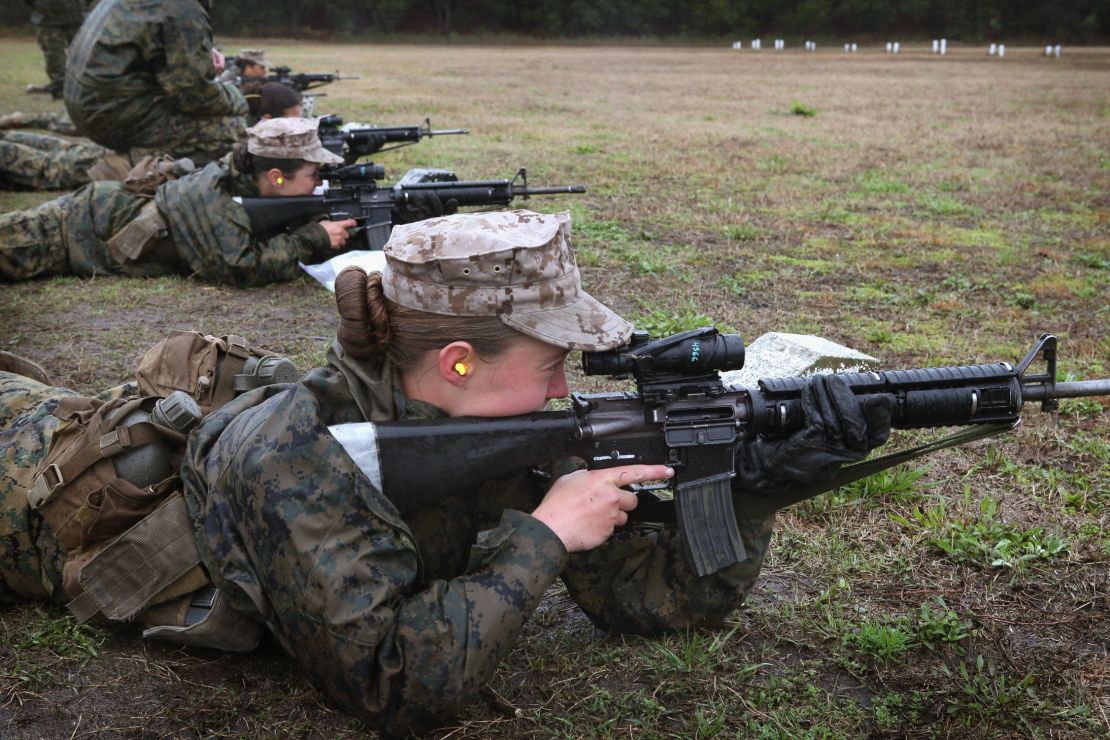 Female Marine recruits on the rifle range during boot camp at Parris Island, South Carolina. 