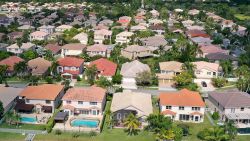 MIRAMAR, FLORIDA - OCTOBER 27:  In this aerial view, single family homes are shown in a residential neighborhood on October 27, 2022 in Miramar, Florida. The rate on the average 30-year fixed mortgage hit 7.08%, up from 6.94% the week prior, according to Freddie Mac. Mortgage rates surpassed 7% for the first time since April 2002. (Photo by Joe Raedle/Getty Images)