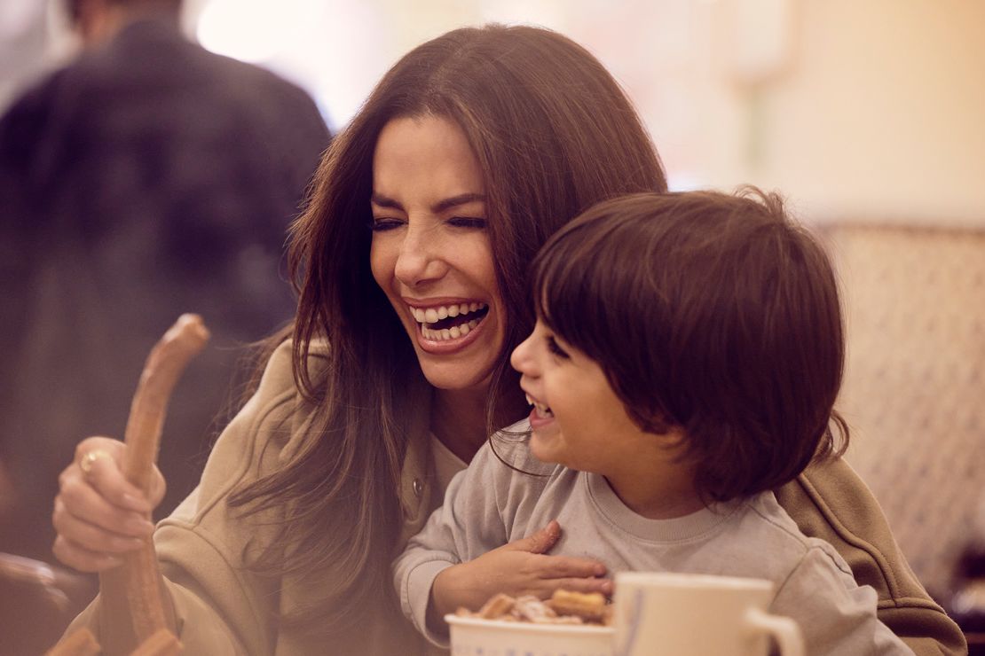 Longoria and her 4-year-old son, Santiago, enjoy churros during the filming of "Searching for Mexico." 