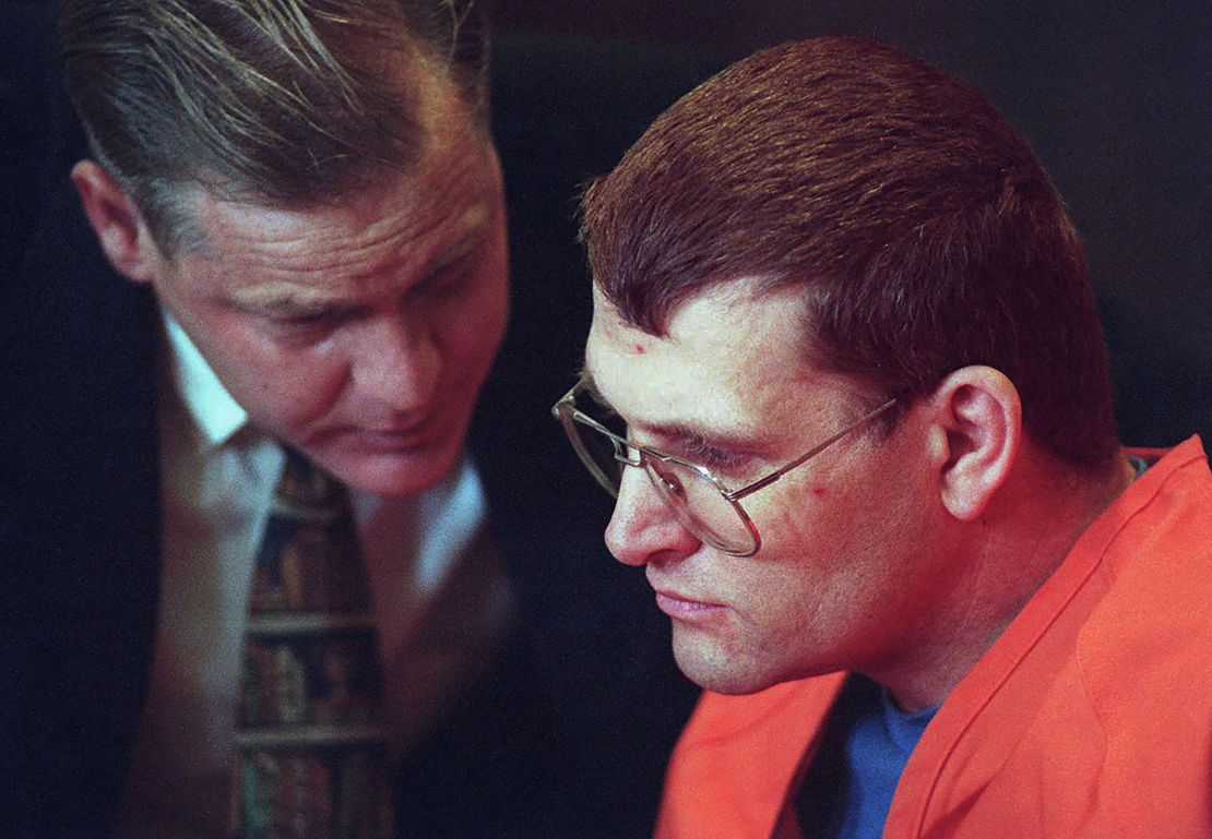 Keith Hunter Jesperson, right, listens to his attorney  moments before pleading guilty to murder charges in October 1995. 