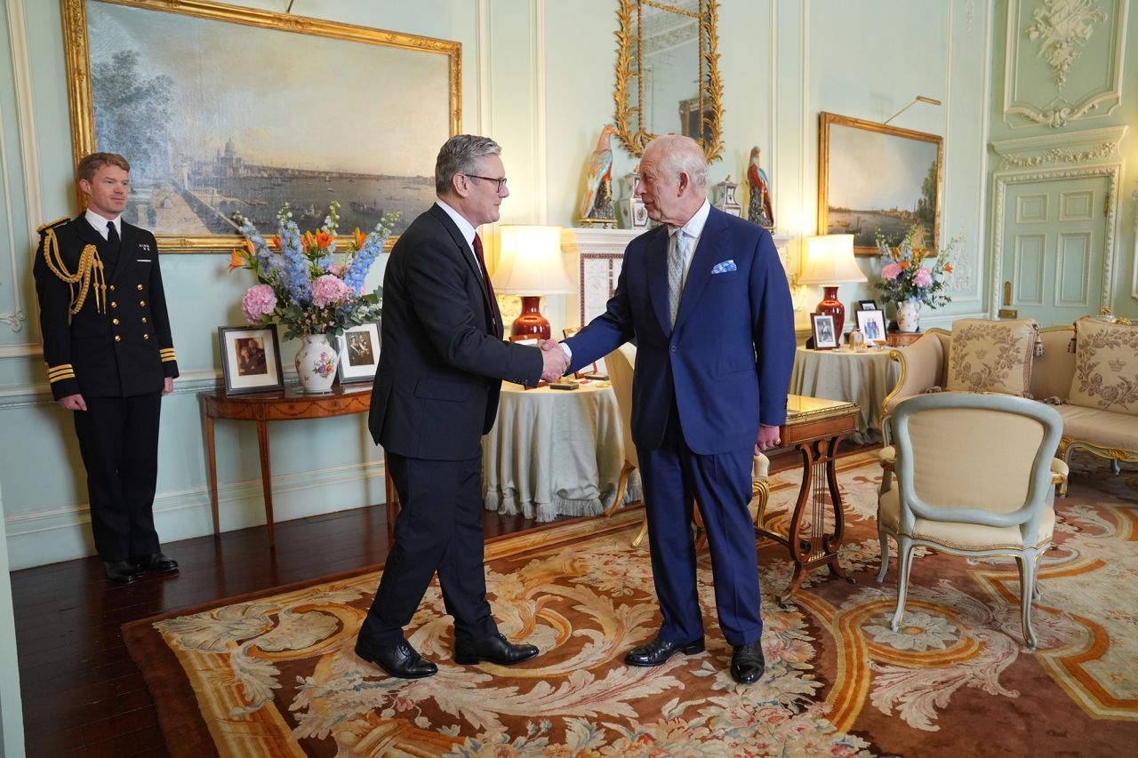 King Charles III, right, welcomes Sir Keir Starmer during an audience at Buckingham Palace, London, on July 5.