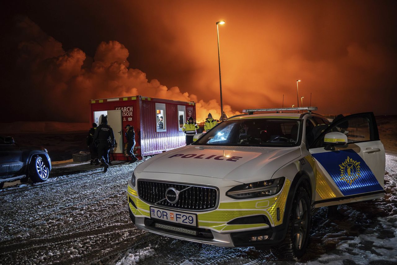 A police vehicle is parked at the entrance of the road to Grindavík, Iceland, on December 18. 