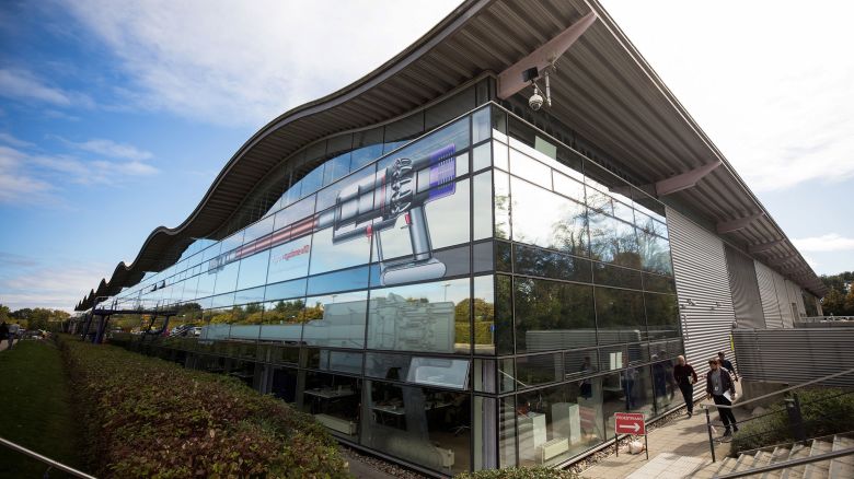 In this September 2018 photo, a graphic of a Dyson Cyclone V10 cord-free vacuum cleaner is displayed on the side of a building at the Dyson Group Plc campus in Malmesbury in north Wiltshire, England.