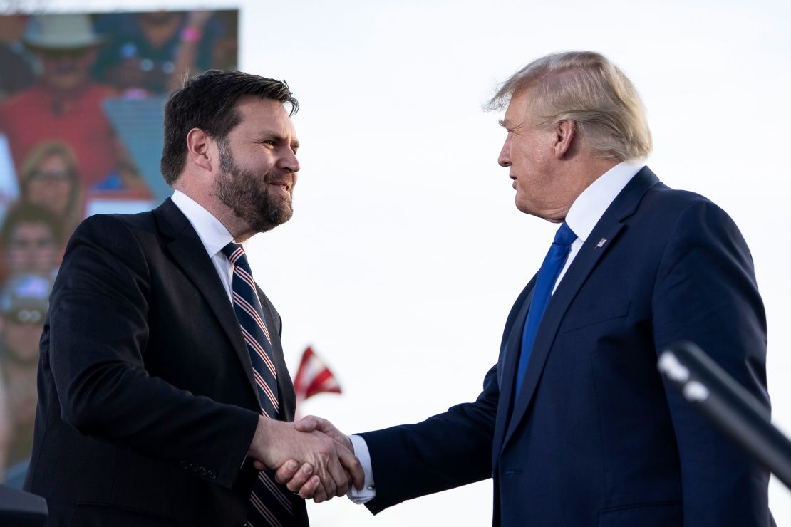 In this April 2022 photo, J.D. Vance shakes hands with former President Donald Trump during a rally hosted by the former president at the Delaware County Fairgrounds on in Delaware, Ohio.