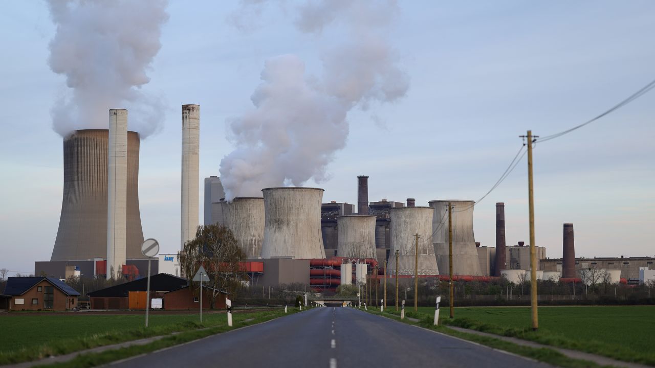 Water vapour rises from cooling towers of the Niederaussem coal-fired power plant on March 25, in Bergheim, Germany.