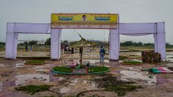 People walk around the venue of a stampede a day after it occurred on July 3, 2024 in Hathras, India.