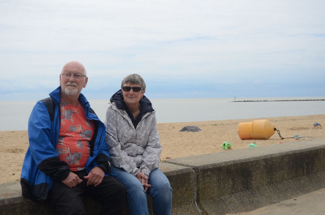 “The people who live over here can’t get appointments, but if you come over on a boat you’re immediately rushed off to hospital or the dentist. That’s how it seems,” says Bridget Tyril, on a bracing walk along the coast with her friend, Roy Whitehead. People who enter the UK irregularly can only access some medical care, and they are not placed before UK residents on waiting lists.