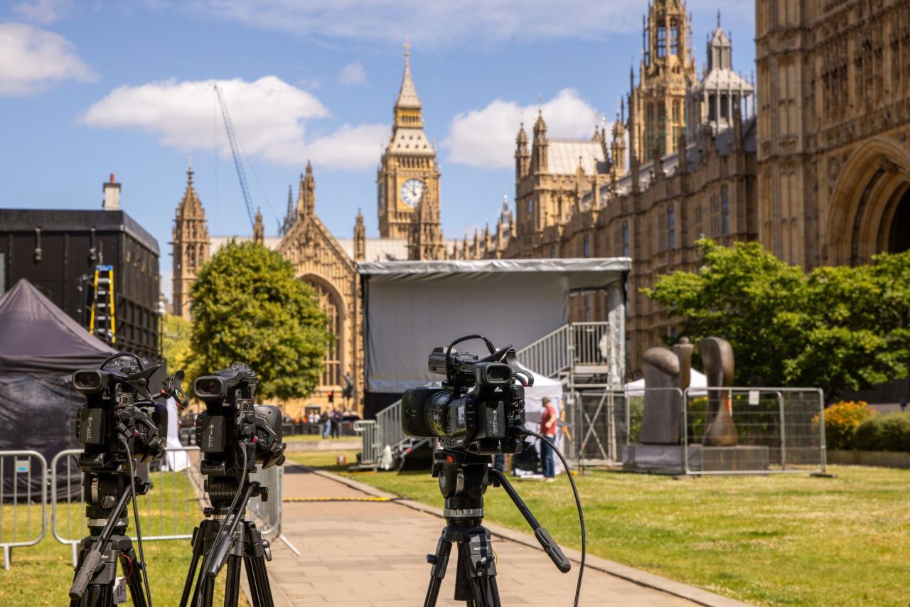 Members of the media set up broadcast positions in view of the Houses of Parliament in London, on Thursday, July 4. 