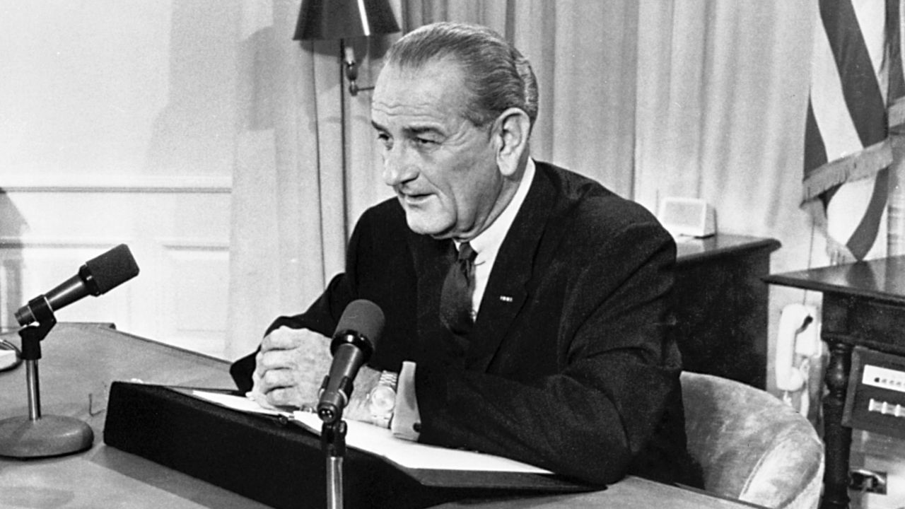 President Lyndon B. Johnson tells a nationwide audience that he would not seek nor accept "the nomination of my party for another term as your president," on March 31, 1968. 