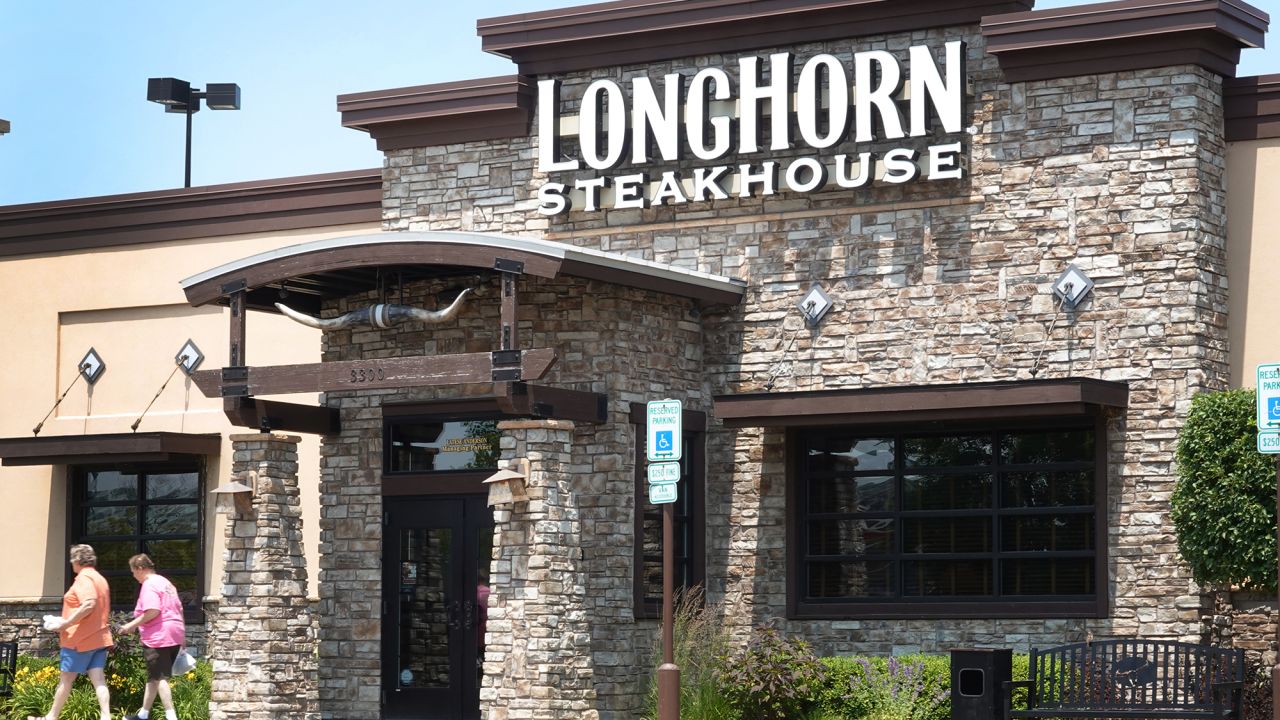 Customers leave a LongHorn Steakhouse restaurant on June 22, 2023 in Skokie, Illinois.