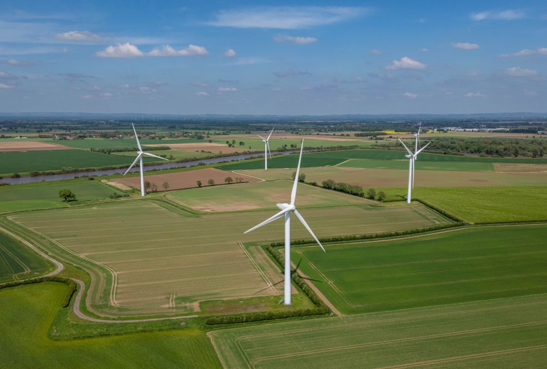 Wind turbines in a field near Selby, UK in May, 2024. The Labour Party hopes to unleash private investment into the clean energy transition.