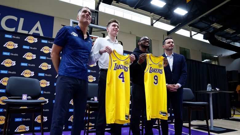 Rob Pelinka, Dalton Knecht, Bronny James and JJ Redick of the Los Angeles Lakers pose for a photo after a press conference at UCLA Health Training Center in El Segundo, California on July 02, 2024. The Lakers selected Bronny James and Dalton Knecht in the 2024 NBA Draft.