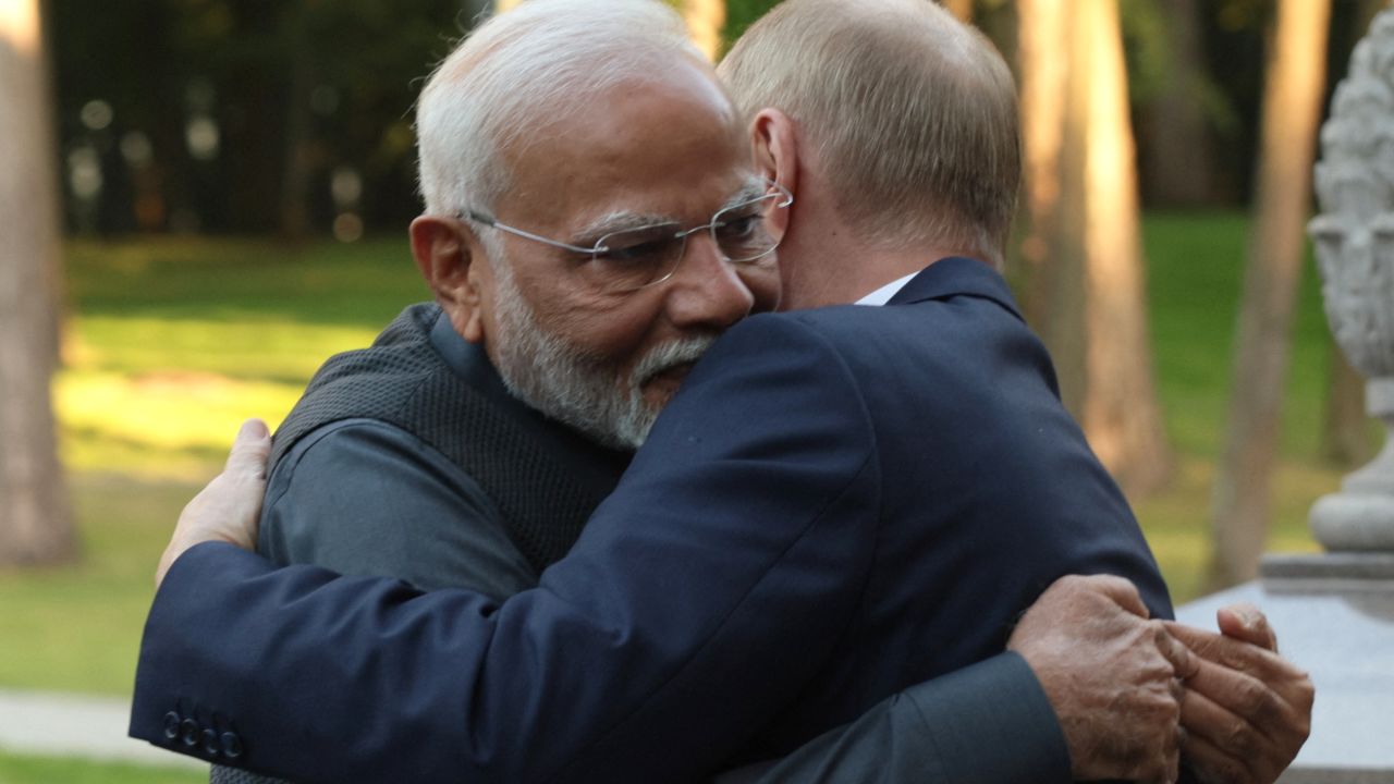 In this pool photograph distributed by the Russian state agency Sputnik, Russia's President Vladimir Putin and Indian Prime Minister Narendra Modi embrace each other during an informal meeting at the Novo-Ogaryovo state residence, outside Moscow, on July 8, 2024. (Photo by Gavriil GRIGOROV / POOL / AFP) (Photo by GAVRIIL GRIGOROV/POOL/AFP via Getty Images)