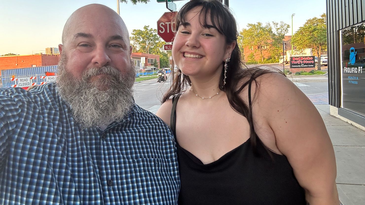 Writer Shannon Carpenter and his daughter, Vivi, 18, celebrate her high school graduation in Lee's Summit, Missouri. He's proud his daughter had the confidence to come out to him three years ago.