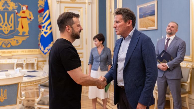 A handout photo provided by Ukrainian Presidential Press Service shows Ukrainian President Volodymyr Zelensky meeting with World Athletics President Sebastian Coe.