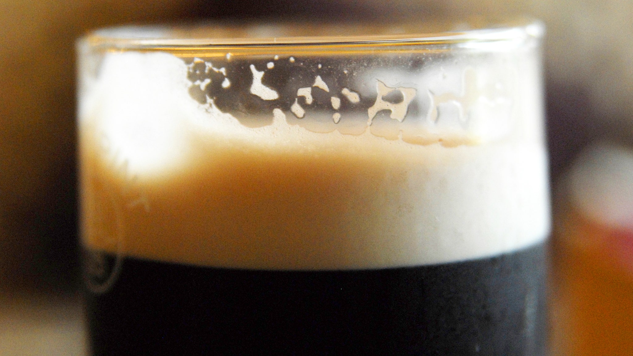 Image may contain Drink Beer Alcohol Beverage Stout and Candle