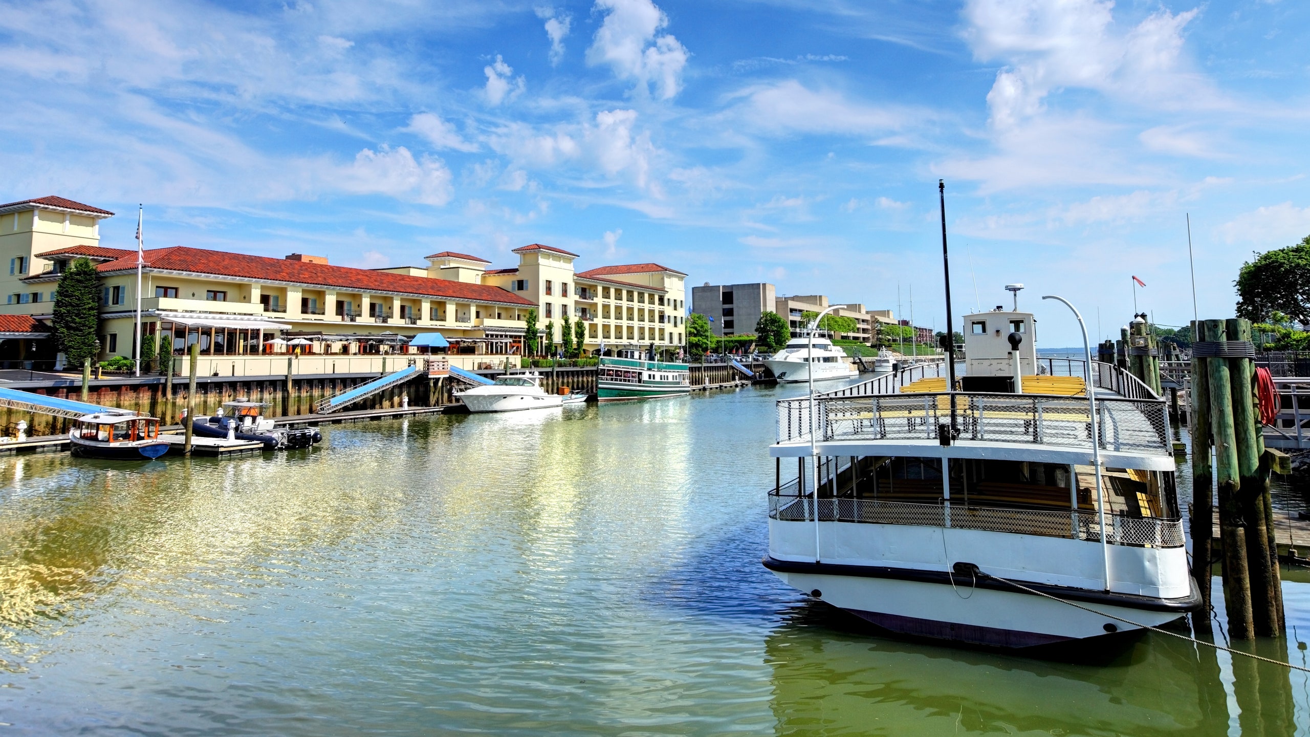 Image may contain Vehicle Transportation Boat Vessel Watercraft Water Waterfront Ferry Dock Port Pier and Marina