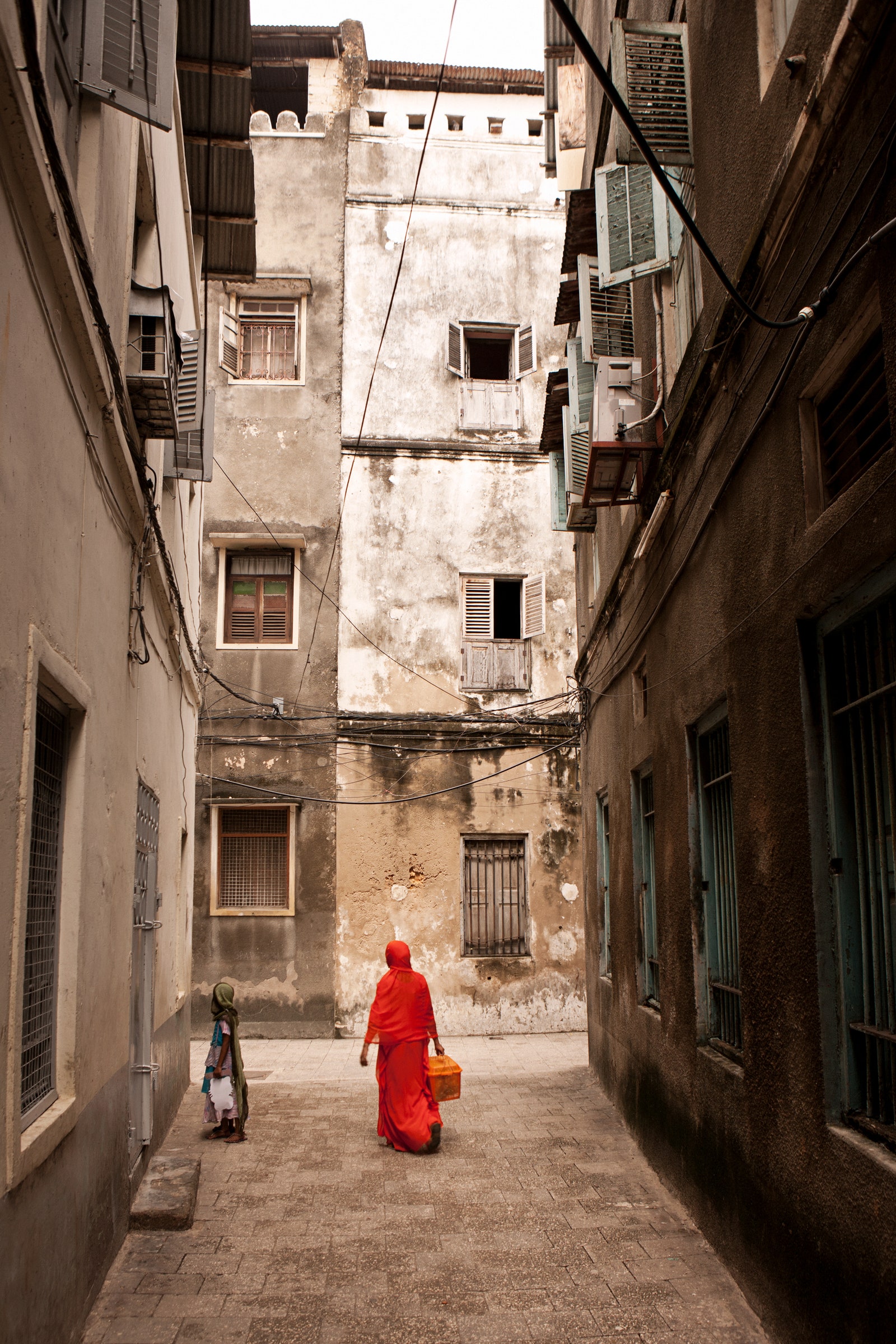 a street scene in Stone Town Zanzibars historic district and a center of the spice trade in the 19th century