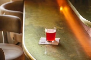 Image may contain Cup Glass Chair Furniture Alcohol Beer Beverage Cocktail Juice Table Indoors and Restaurant
