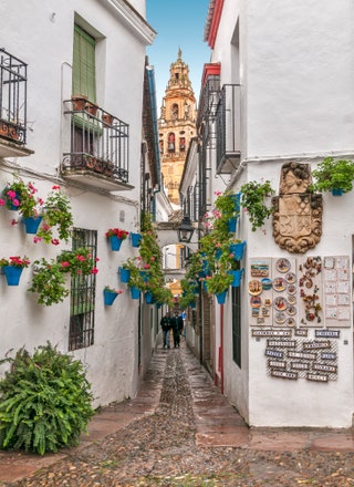 white walls with path leading to church