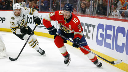 Panthers and Bruins battle for the puck