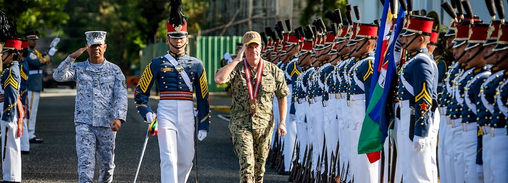 Adm. Samuel J. Paparo, right, commander of U.S. Indo-Pacific Command, receives military honors at the Philippine Military Academy, led by Rear Adm. Caesar Valencia, left, superintendent of the PMA, during an overseas trip, Aug. 29, 2024.