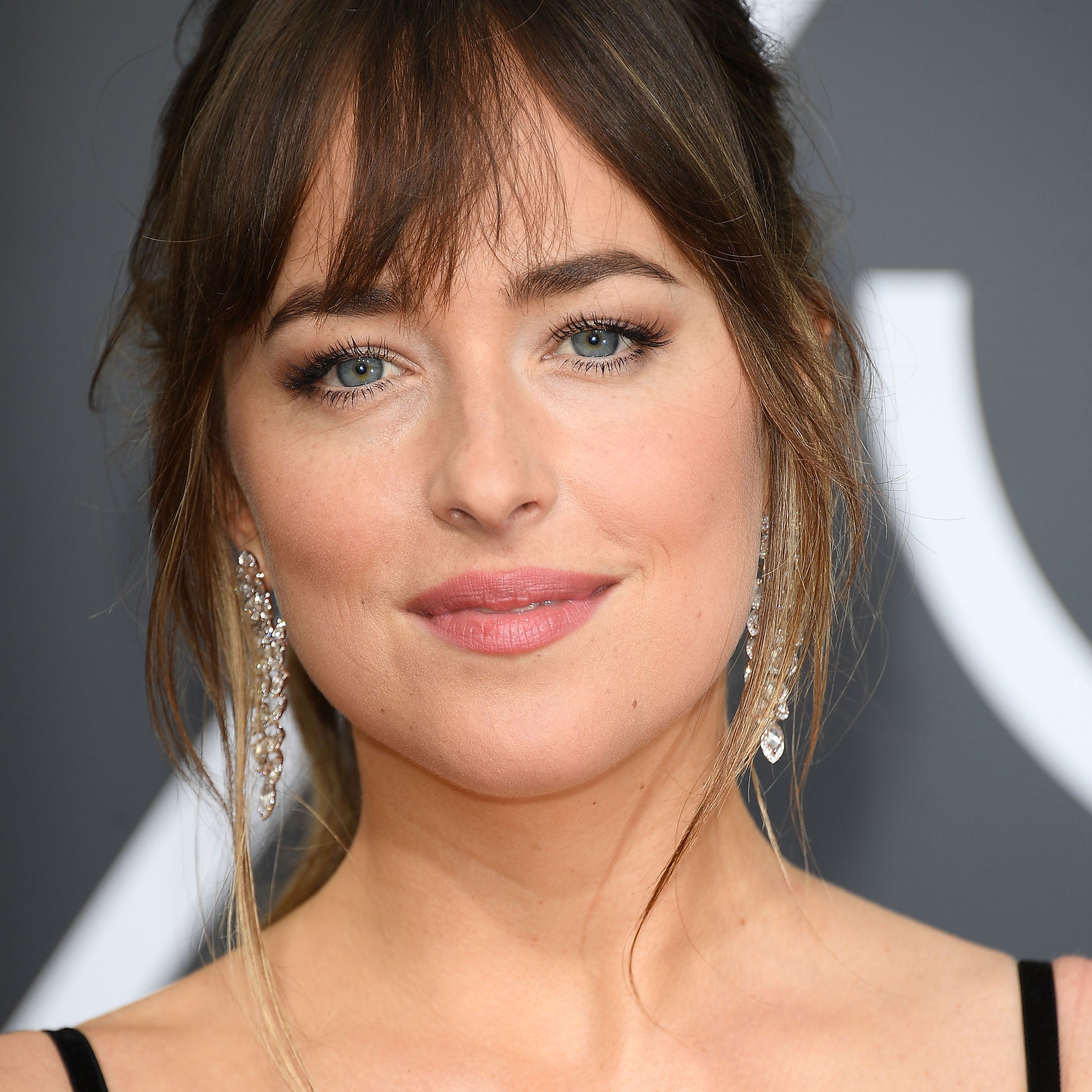 Dakota Johnson Spotted at Chris Martin's Coldplay Concert Amid Confusing Relationship Reports