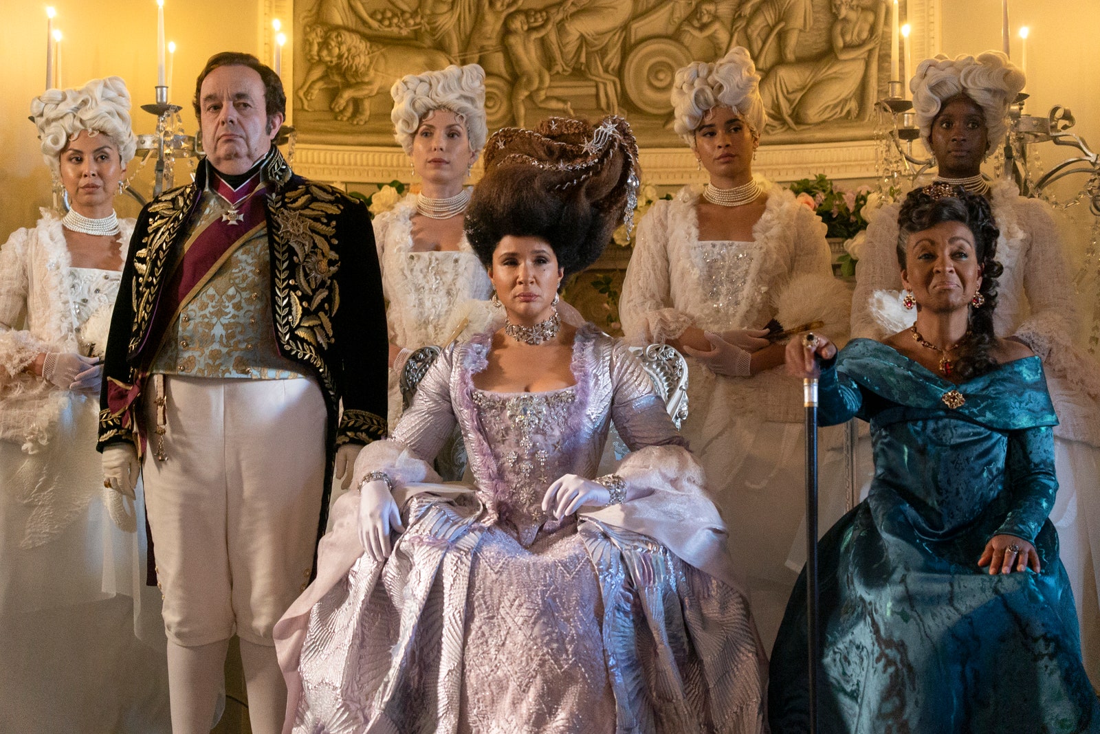 Bridgerton.  Hugh Sachs as Brimsley Golda Rosheuvel as Queen Charlotte Adjoa Andoh as Lady Agatha Danbury in episode 302...