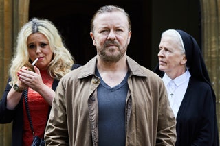 Image may contain Ricky Gervais Human Person Suit Coat Clothing Overcoat Apparel and Face
