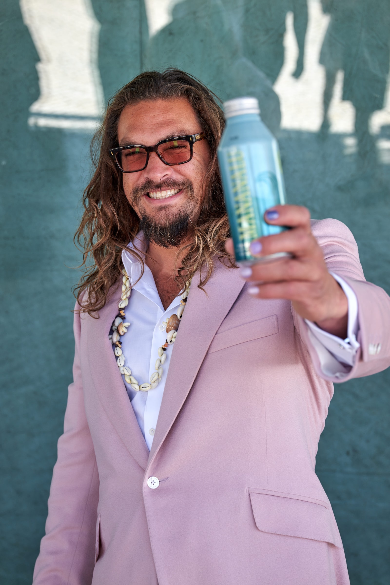 Image may contain Glasses Accessories Accessory Human Person Jason Momoa Clothing and Apparel