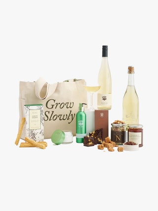 Image may contain Accessories Bag Handbag Bottle Alcohol Beverage Liquor Wine Wine Bottle Herbal Herbs and Plant