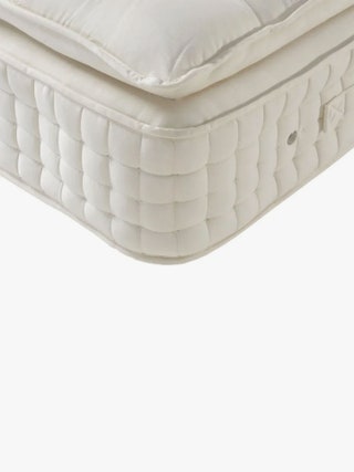 Image may contain Furniture Mattress Crib and Infant Bed