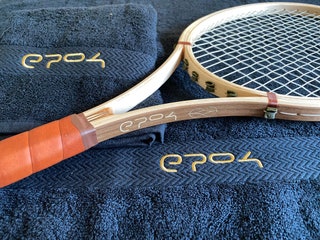 Image may contain Racket Sport Tennis and Tennis Racket