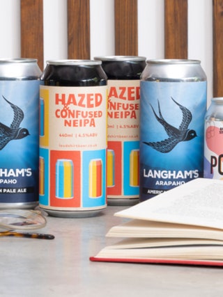 Image may contain Tin Can Animal Bird Alcohol Beer and Beverage