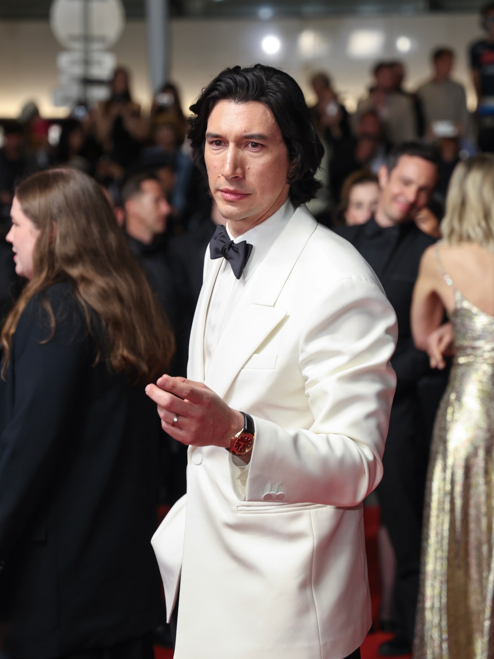 Image may contain Adam Driver Fashion Clothing Formal Wear Suit Accessories Tie Wristwatch Adult and Person