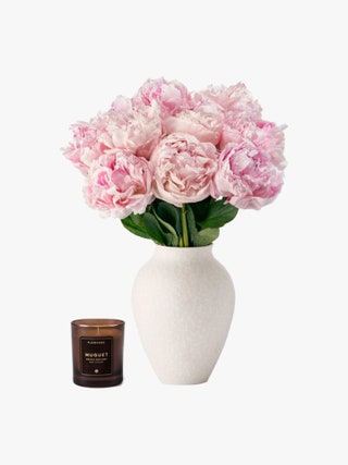Image may contain Flower Plant Flower Arrangement Jar Flower Bouquet Pottery Rose Vase Carnation and Potted Plant