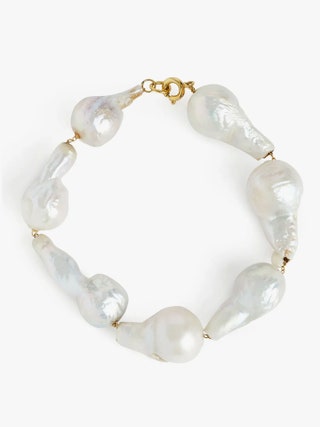 Image may contain Accessories Bracelet Jewelry Necklace and Pearl