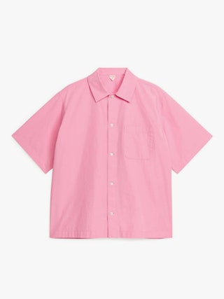 Image may contain Clothing Shirt Sleeve Blouse and Long Sleeve