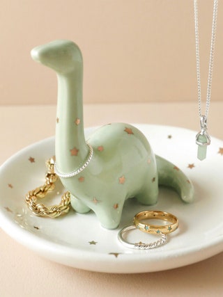 Image may contain Accessories Art Porcelain Pottery Jewelry and Necklace