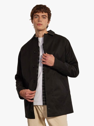 Image may contain Clothing Coat Overcoat Jacket Adult and Person